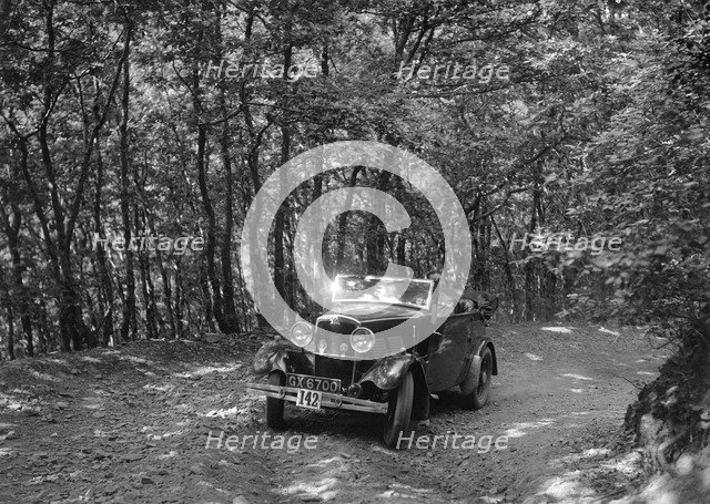 Crossley of CR Simnett competing in the B&HMC Brighton-Beer Trial, Fingle Bridge Hill, Devon, 1934. Artist: Bill Brunell.