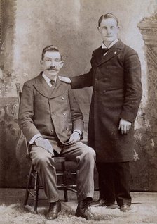 Reverend Eavens, a man with a hole in his chest, seated; with Reverend Kipe, standing, c1880s. Creator: WC Bell.
