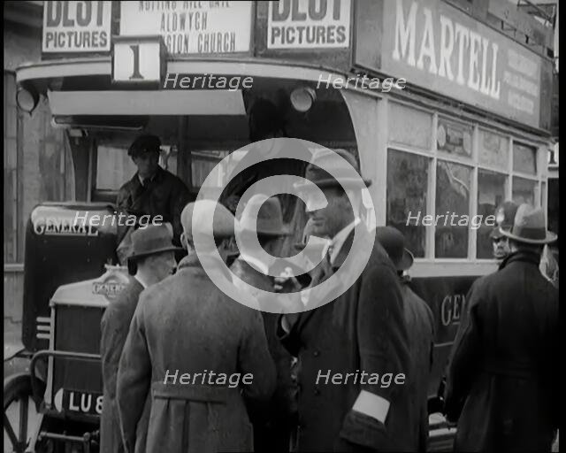 Volunteer Male Civilian Driving a Tram With a Police Escort Sitting Beside Him, 1926. Creator: British Pathe Ltd.