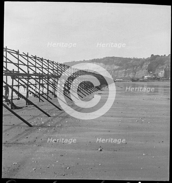 Looking south along a line of Admiralty scaffolding, Shanklin beach, Isle Of Wight, 1940-46.  Creator: George R Long.