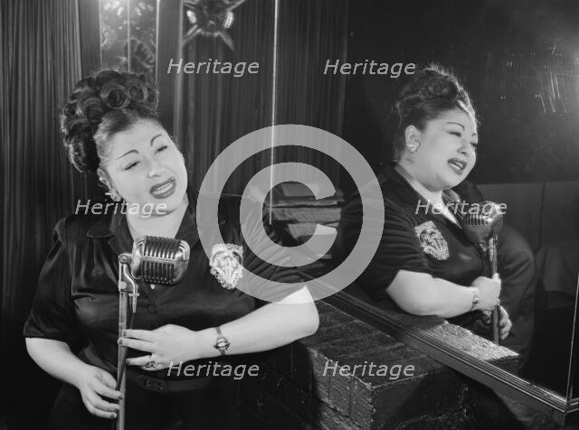 Portrait of Sylvia Syms, Little Casino(?), New York, N.Y., ca. June 1947. Creator: William Paul Gottlieb.