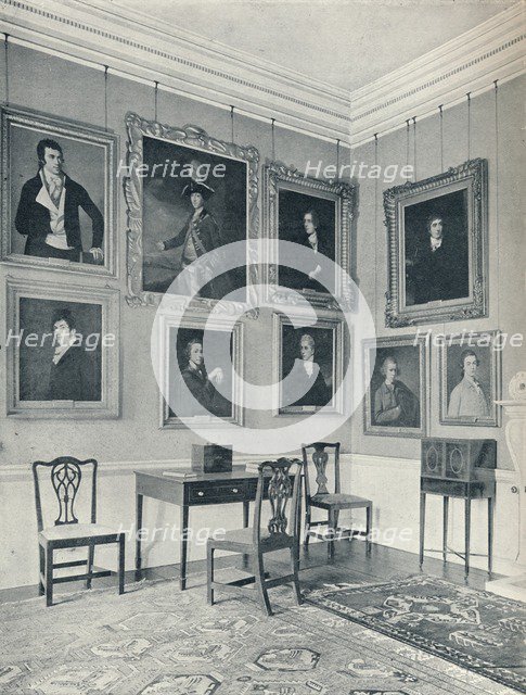 Leaving Portraits in the Drawing-Room', 1926. Artist: Unknown.