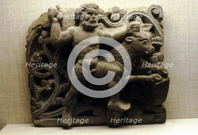 Comic relief, Egyptian Limestone, Herakles and the Cretian Bull, 4th century.  Artist: Unknown.