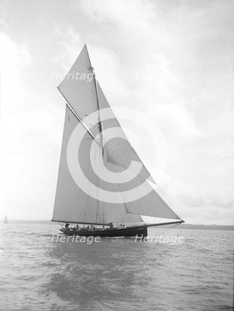 The gaff rigged cutter 'Bloodhound' sailing close-hauled, August 1911. Creator: Kirk & Sons of Cowes.