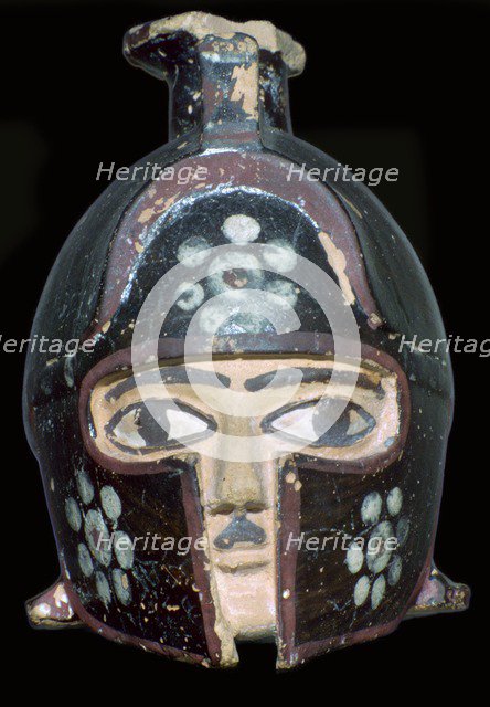 Terracotta scent-bottle in the shape of a helmeted head, Rhodes, Greece, c600-550BC. Artist: Unknown
