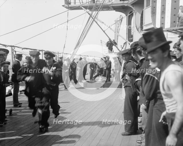 U.S.S. New York, 3 legged race, anniversary of Santiago, 1899 July 3. Creator: Unknown.