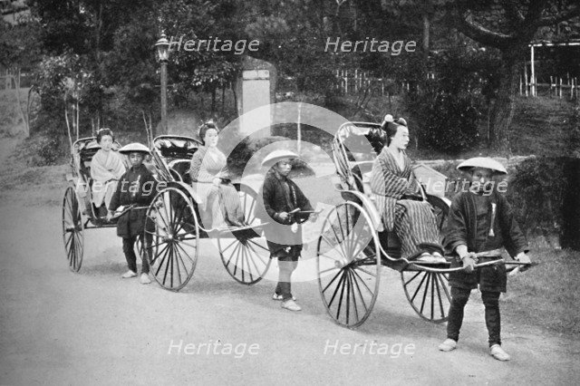 Japanese ladies in rickshaws drawn by coolies, 1902. Artist: Unknown.