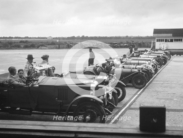 Cars on the start line at the JCC Members Day, Brooklands, 4 July 1931. Artist: Bill Brunell.