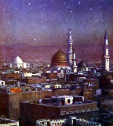 View of Medina, Arabia, by moonlight, showing the dome of the Tomb of the Prophet, 1918. Artist: Etienne Dinet