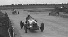 MG racing at Brooklands, Surrey, c1930s. Artist: Bill Brunell.