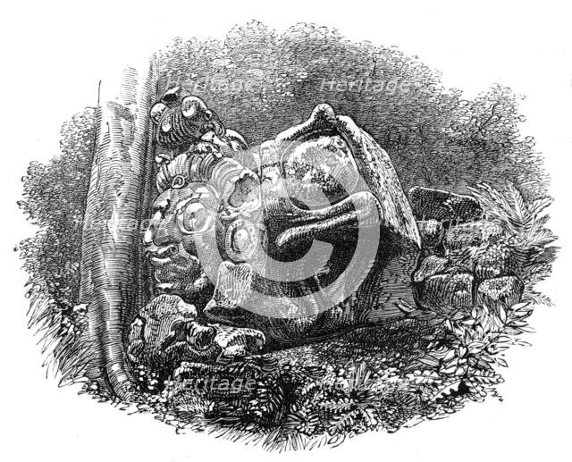 The Ruins of Copan, Central America: a head, with other sculptured stones, 1864. Creator: Unknown.
