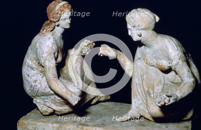 Terracotta group of 'knucklebone' (astragalos) players, Hellenistic Greek, c330-c300 BC. Artist: Unknown