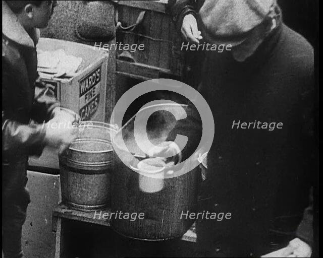 Three Men Receiving Hot Drinks, 1933. Creator: British Pathe Ltd.
