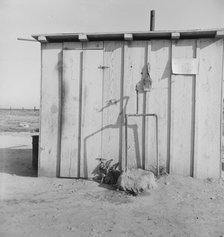 Water supply for ten cabins in Arkansawyers auto camp. Greenfield, Salinas Valley, California, 1939. Creator: Dorothea Lange.