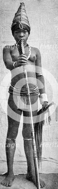 A Nigerian girl dressed in her wedding finery, 1922.Artist: Northcote Thomas