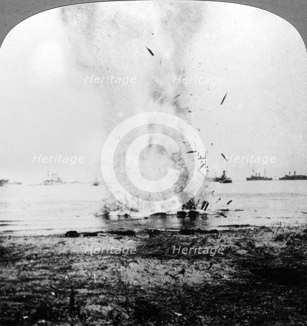 Trapped German submarine driven inshore and destroyed, World War I, 1914-1918Artist: Realistic Travels Publishers