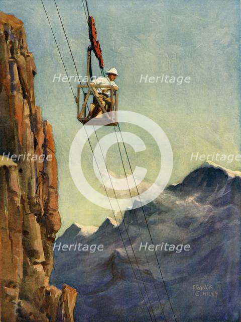 'Engineers at Work on a Mountain Ropeway', c1930. Creator: Francis E Hiley.