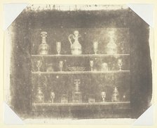 Articles of Glass on Three Shelves, c. 1844. Creator: William Henry Fox Talbot.