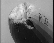 Front View of the 'R.33' Zeppelin With a Dented and Damaged Nose After Flying Through a Storm, 1924. Creator: British Pathe Ltd.