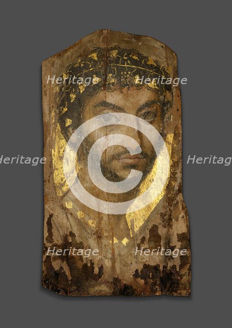 Mummy Portrait of a Man Wearing an Ivy Wreath, Fayum, Early to mid-2nd century. Creator: Unknown.