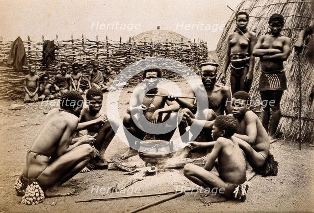Africa: men of the Hlubi tribe eating, between 1800 and 1899. Creator: Unknown.
