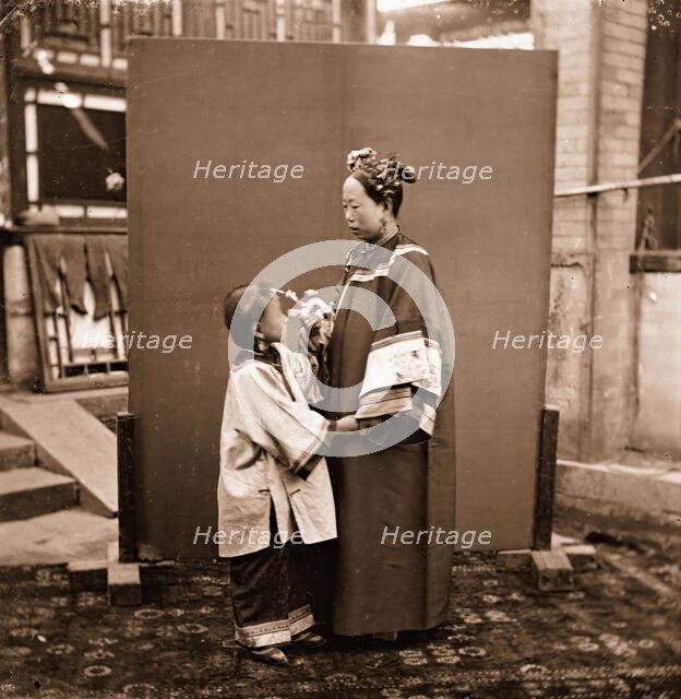 China: a Manchu lady with a child, Beijing, 1869. Creator: John Thomson.