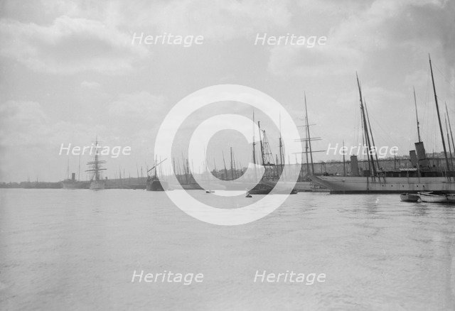 Yachts tying up at Cowes. Creator: Kirk & Sons of Cowes.