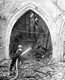 British firefighters damping down a bombed church, World War II, June 1940. Artist: Unknown