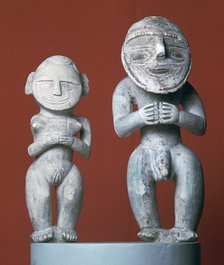 Male and female ancestor figures from Melanesia. Artist: Unknown