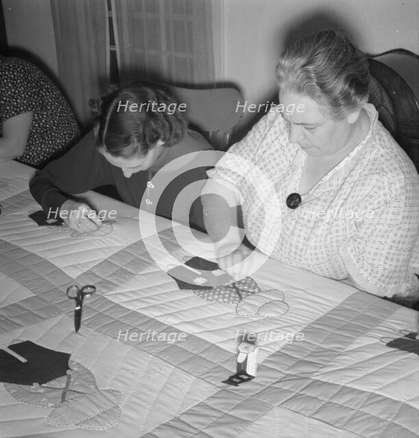 Farm women working on quilt, near West Carlton, Yamhill County, Oregon, 1939. Creator: Dorothea Lange.