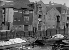 Riverside view of Dunbar Wharf, Narrow Street, London, c1945-c1965. Artist: SW Rawlings