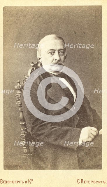 Kraevskii, Andrei Aleksandrovich, half-length portrait, seated, facing..., between 1880 and 1886. Creator: Unknown.