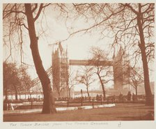 The Tower Bridge from the Tower grounds. From the album: Photograph album - London, 1920s. Creator: Harry Moult.