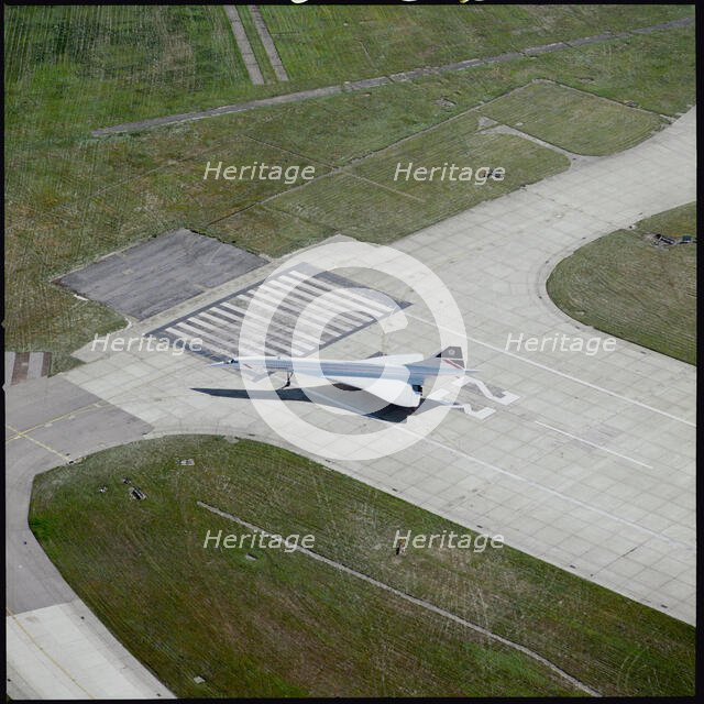 Concorde at London Heathrow  Airport, Harlington, 1989. Creator: Aerofilms.