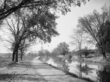 Bicycle path and canal, Indianapolis, Ind., between 1900 and 1910. Creator: Unknown.
