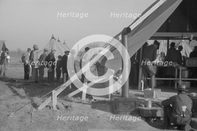 Possibly: The kitchen in the camp for white flood refugees at Forrest City, Arkansas, 1937. Creator: Walker Evans.
