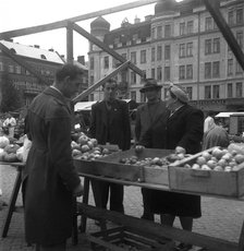Fruit and vegetable stall in the market, Malmö, Sweden, 1947. Artist: Otto Ohm