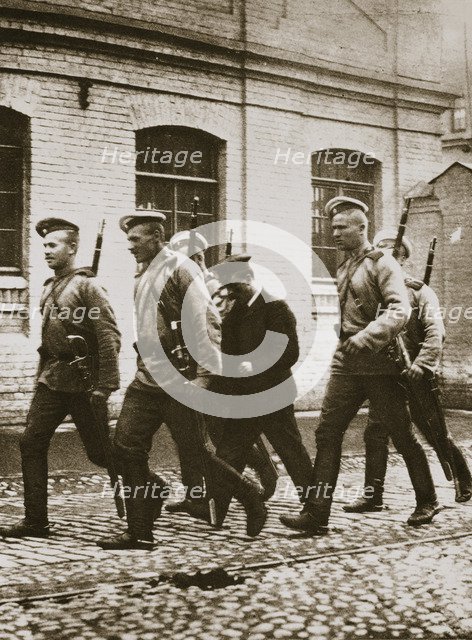 A patrol hunting down suspects following the revolt at Vyborg, Russia, early 20th century. Artist: Unknown