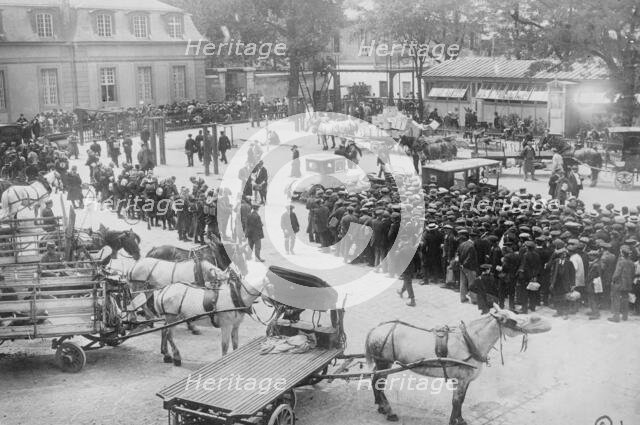 Reservists and wagons under requisition, Latour Maubourg, between c1914 and c1915. Creator: Bain News Service.