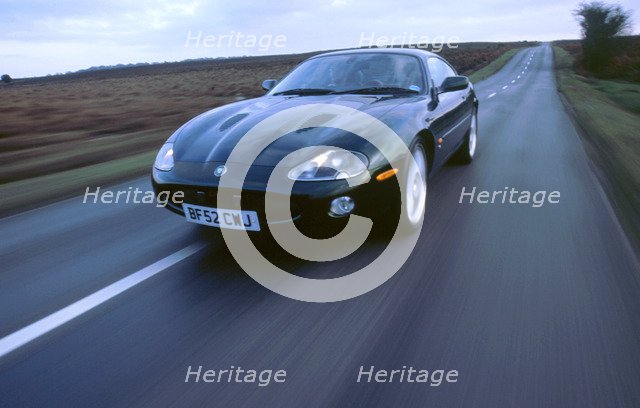 2002 Jaguar XKR coupe. Artist: Unknown.