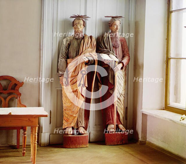 Two carved wooden statues of bearded men with haloes above their head..., between 1905-1915. Creator: Sergey Mikhaylovich Prokudin-Gorsky.