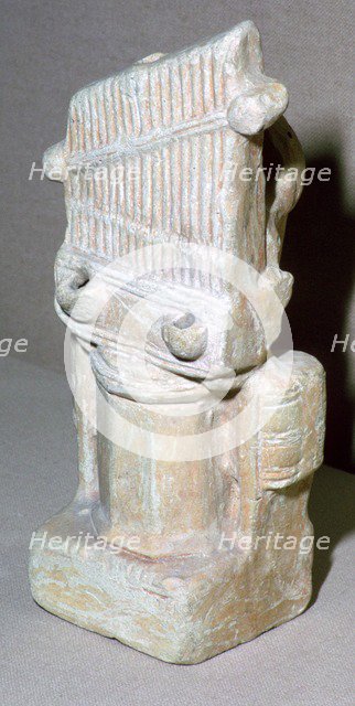 Roman terracotta lamp in the shape of a water-organ. Artist: Unknown