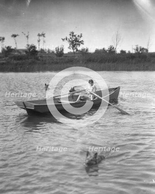 Lewisohn, Walter, Master, in a rowboat, 1926? Creator: Arnold Genthe.