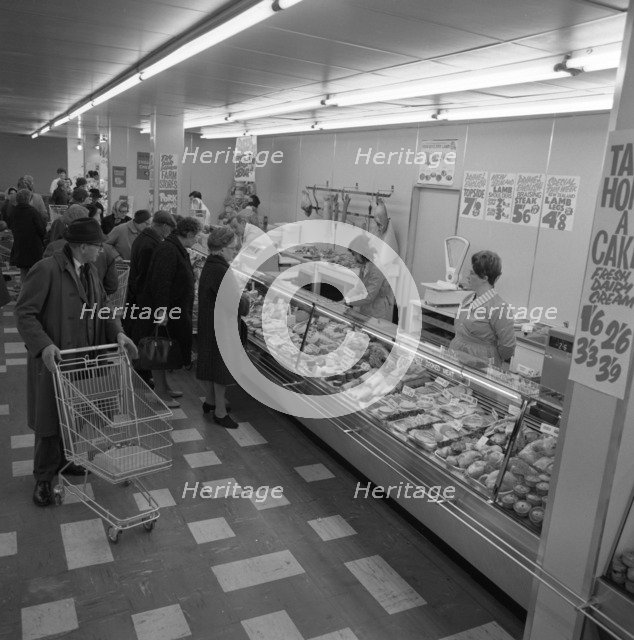 The meat counter at the ASDA supermarket in Rotherham, South Yorkshire, 1969.  Artist: Michael Walters
