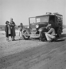 Drought refugee family from McAlester, Oklahoma, 1936. Creator: Dorothea Lange.