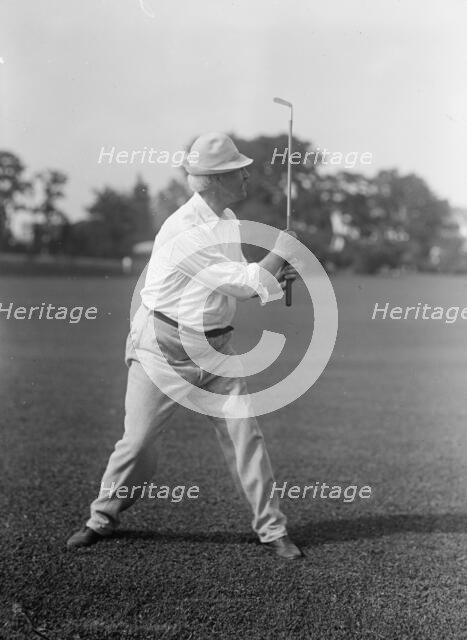 Cummins, Albert Baird, Governor of Iowa, 1902-1908; Senator, 1908-1926. Playing Golf, 1917. Creator: Harris & Ewing.