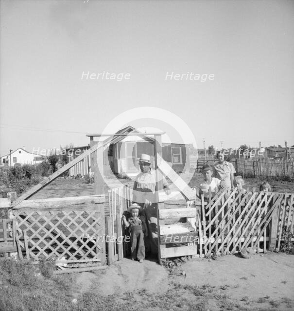 Family from Oklahoma, Highway City, near Fresno, California, 1939. Creator: Dorothea Lange.