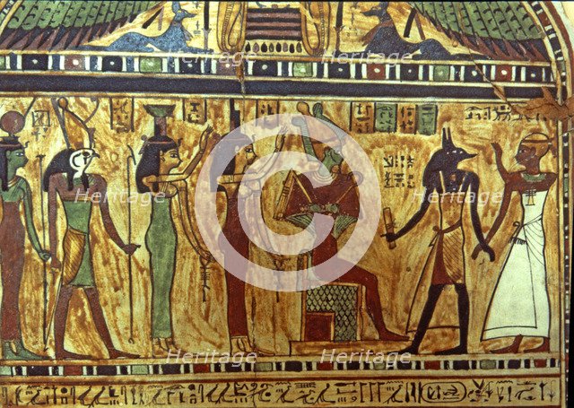 Anubis presents the deceased to Osiris, with Horus and other deities present, funerary stela from…