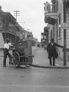 Organ grinder, New Orleans, between 1920 and 1926. Creator: Arnold Genthe.