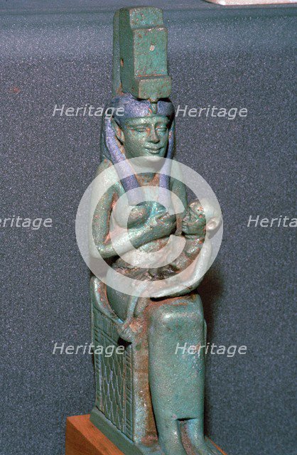 Bronze statuette of the Egyptian goddess Isis suckling Horus. Artist: Unknown